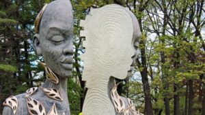 wood sculpture of African woman